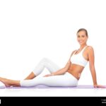 happy-woman-yoga-exercise-and-portrait-with-white-background-wellness-and-isolated-mockup-in-studio-fitness-model-smile-and-pilates-workout-on-mat-2M89WKG